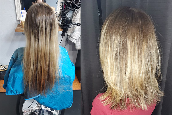 Girl getting her long hair cut and styled