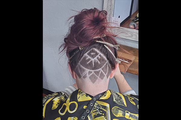 Girl with Hair Tattoo Cut