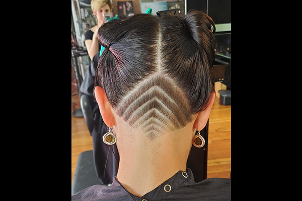 Girl with wedge lines Hair Tattoo Cut